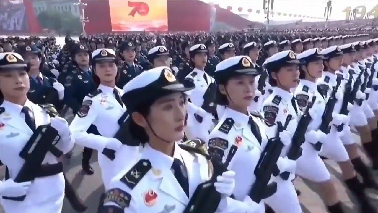 adrienne daniel recommends chinese girl dancing in military uniform pic