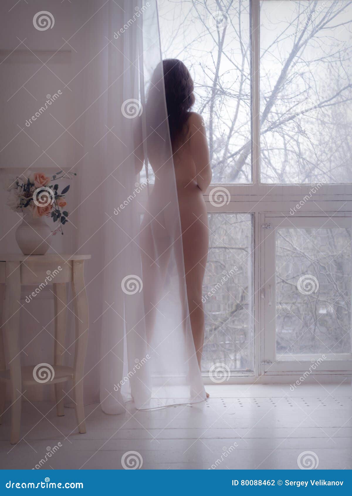 naked by window