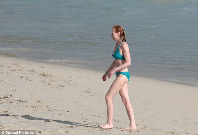 conor cusack add marg helgenberger in a bikini photo
