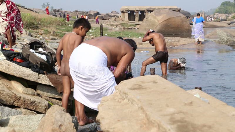 alan ally recommends naked indian bathing pic